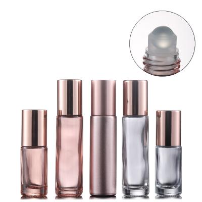 China 10ml Rose Gold Glass Roller Bottles Cosmetic Refillable Light Pink Perfumes Roll On Bottle With Stainless Steel Balls for sale