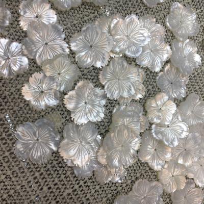 China Pearl Flower 20mm 25mm 30mm White Sea Shell Broom Flower Pearl Color Game Or Fire Lily Pad Mother for sale