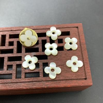 China White color game or fire pearl shell flower 8.5*8.5mm cut out four leaf clover cabochon pearly bead for sale