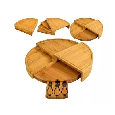 China Round Cheese Viable Cutting Board Bamboo Multifunctional Bread Pizza Cutting Board for sale