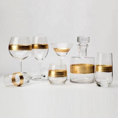 China New custom-made stemless crystal glass classic/postmodern gold leaf wedding or restaurant wine glass for sale