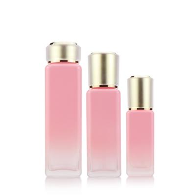 China Premium 40 100 150ml Personal Care Lotion Cream Packaging Rose Skin Care Glass Bottle Empty Pump Set For Makeup With Cap for sale