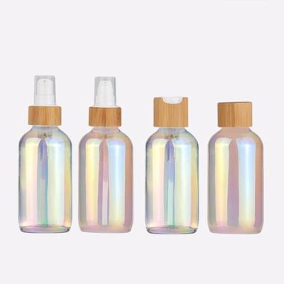 China Personal Care Holographic/Symphony/Multicolor 10ml 15ml 20ml 30ml 50ml 60ml round shape dropper glass bottles for sale