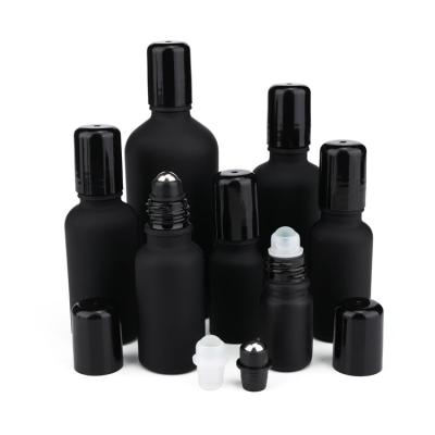 China Personal Care Bulk 5 10 15 20 Gram 30 50 100 Ml Medical Oil Frosted Black Essential Oil Roller Bottles With Platic Lids for sale