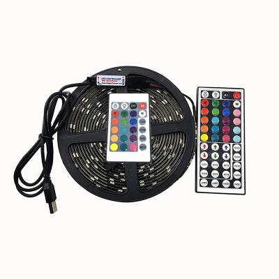 China Household KTV Warehouse Langdscape Theme Park Wall Waterproof DC5V 0.5 1 2M Black PCB SMD5050 RGB LED Strip Light Backlight With RF17 Controller 24 44 USB Mini Headlight Kit the television for sale