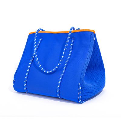 China Hot Selling Fashion Neoprene Beach Perforated Tote Bag For Woman for sale