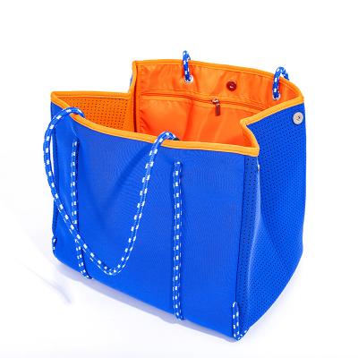 China Hot Sale Fashion Travel Perforated Neoprene Flat Bottom Bag Tote Bag Beach For Woman for sale