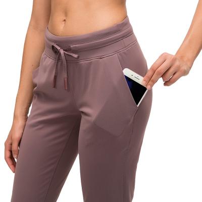 China Anti-Wrinkle Women's Workout Jogger Running Sweatpants With Pocket Drawstring Relaxed Joggers Fit Bottom Slim Pants for sale