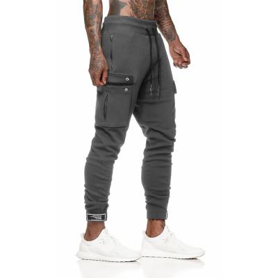 China Autumn New Male Sportswear Pocket Men's Casual Pants Anti-Wrinkle Mens Joggers Sweatpants Fitness Workout Pants for sale