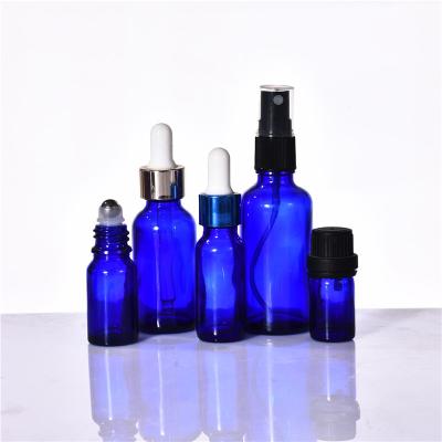 China Wholesale 5ml 10ml 15ml 50ml 100ml Cosmetic Hot Sale Blue Glass 20ml Luxury 30ml Dropper Glass Bottle for sale