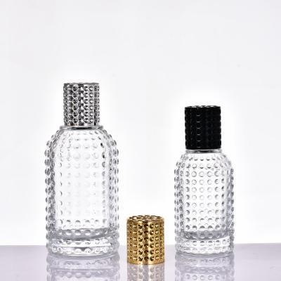 China Customized Cosmetic Products 50ml 100ml Unique Shape Small Empty Single Spray Perfume Bottle for sale