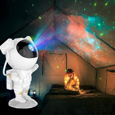 China Modern Starry Sky Projector Lamp Style Night Light Atmosphere Astronaut Table Lamp Room Ornaments Starry Romantic Light Kids Gift for sale