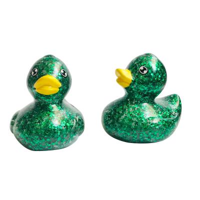 China Bath Toy 2021 Hot Selling Small Vinyl Material Bath Duck Toy With Glitter for sale