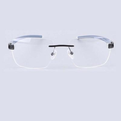 China 2022 New Arrival Optical Eyeglasses Men Women Glasses Frames Fashion Metal Optical Rimless Eyewear Frames Clear Glasses With Temple TR90 for sale