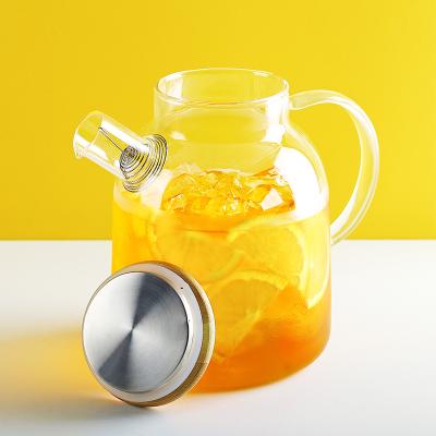 China Viable Heap Mini Borosilicate Glass Teapot Kettle Tea Cup With Syringe Glass Teapot for sale