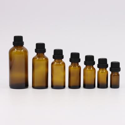 China Personal Care Factory Wholesale 10ml 20ml 30ml 50ml Round Glass Amber Blue Green Essential Oil Bottle for sale