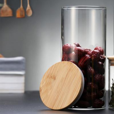 China Sustainable new type of transparent glass fresh-keeping jar with wooden lid jam glass jar with wooden lid for sale