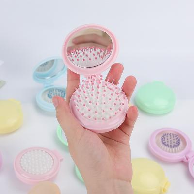 China Home-Use Cute Foldable Plastic Portable Dual-Use Smooth Hair Untied Massage Comb for sale