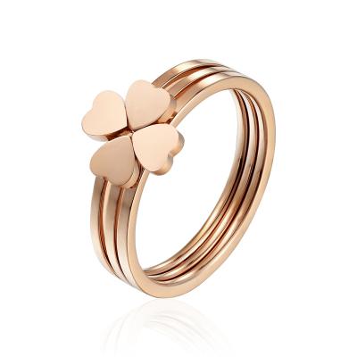 China Trendy Fashion Lovely Three-in-One Fashion Couple18K Gold Plated Stainless Steel Four Leaf Clover Rings For Women Jewelry for sale