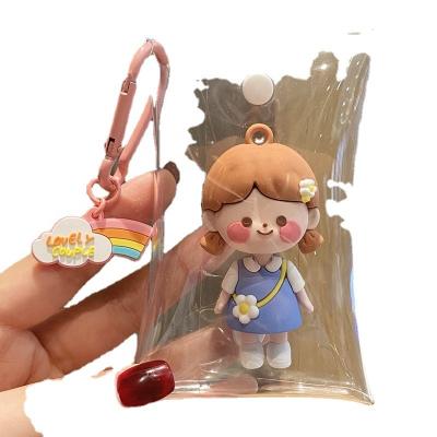 China Cute Creative Car Hanging Ornaments Lovers Lovely Car Pendant Waterproof Baby Backpack Instagram Walking Key Chain Gift for sale