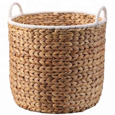 China Large Handmade Natural Round Straw Woven Laundry Beach Basket Eco-friendly Flower Water Hyacinth Plant Plankton With Handle for sale