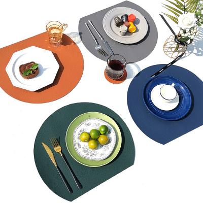 China Sustainable 2 pieces set Nordic non-slip natural table half round pu leather mats and pads placemat coaster for sale