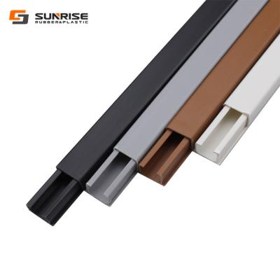 China Good quality sticker pvc plastic fire retardant pvc adhesive arc floor cable trunking duct for sale