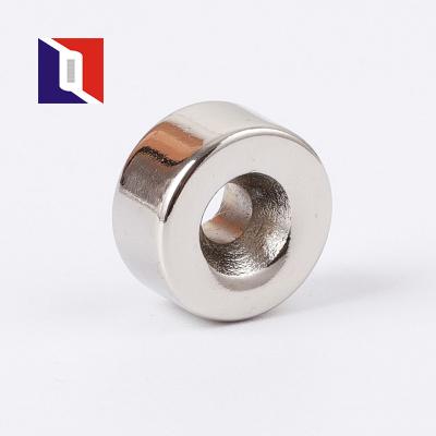 China Industrial Custom Strong Neodymium Countersunk Round Magnet With Screw Hole en venta