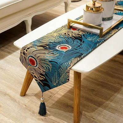 China Beautiful Luxury Jacquard Peacock Feather Pattern Triangle Table Runners for sale