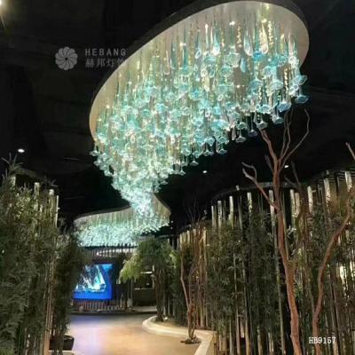 China Residential hotel lobby is decorated with glass chandeliers and large colored glass chandeliers for sale