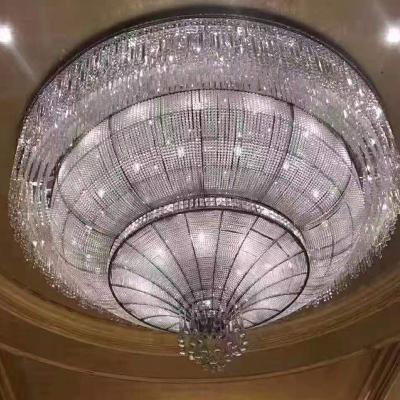 China Residential luxury crystal chandeliers made in China are decorated with the crystal woven net in the lobby. Chandeliers use E14 bulbs for sale