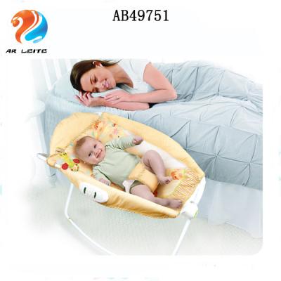 China Popular Safety Sleep Function Folding Baby Swing Rocking Bed with Music and Vibration for sale