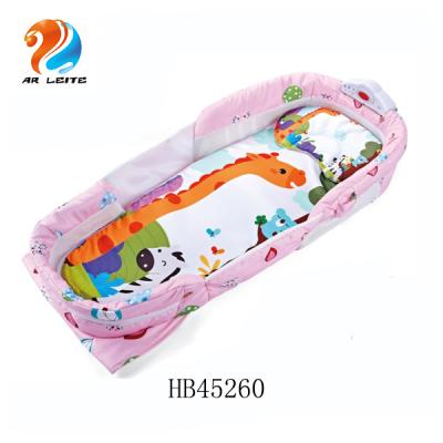 China Wholesale Soft and Safe Travel Portable Foldable Crib Baby Cartoon Toddler Nest Infant Bed with Music and Light for sale