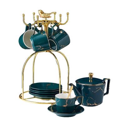 China Sustainable Home Use Ceramic Color Glazed Elegant Shape 14pcs Tea Set With Gold Trim for sale