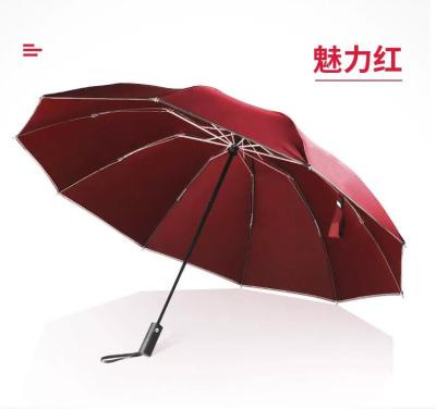 China Ten-bone Wholesale Minimalist Automatic Reverse Black Glue Sunshade Folding Umbrella High Quality Tri Folding Umbrella for sale