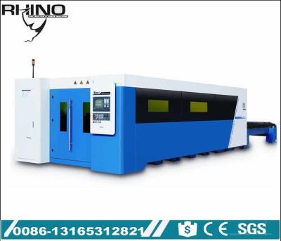 China Full Covered Fiber Laser Cutting Machine Raycus 1000W 2000W Type With Exchange Table for sale