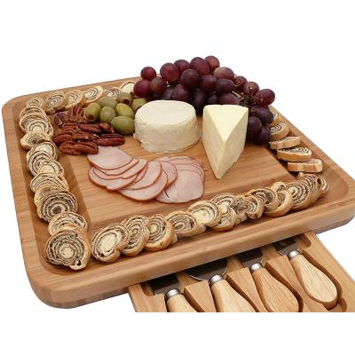 China New Traditional Fashion Bamboo Cheese Cutting Board Cheese Board Set for sale