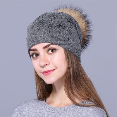 China Unisex Winter Beanie Winter Natural Fur Dobby Wool Knitted Pompom Knitted Hats For Women Fashion Cashmere Wide Cuff Beanies Custom Made for sale