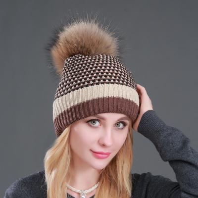 China Fur Pom Pom Hat Custom Wholesale Slouch Beanie Cp Hat Women Winter Raccoon Ladies Dobby Real Knitted Beanie Hat Made In China for sale