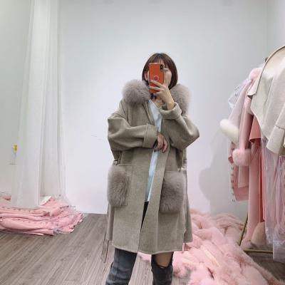 China Breathable Hooded Real Fox Fur Trim Long Jacket Winter Women's Double Sided Cashmere Wool Coat For Ladies for sale