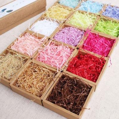 China Gift Wrapping Custom Color Fold Cut Decorative Raffia Shredded Wrapping Paper Fold Gift Box Filler Raffia Lafite Paper for sale