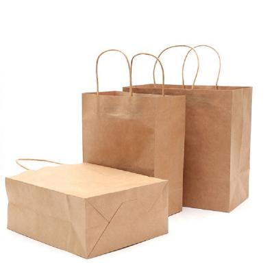 China Recycled Wholesale Tote Bag Custom Printed Kraft Paper Bags Gift Shopping Tote Bags for sale