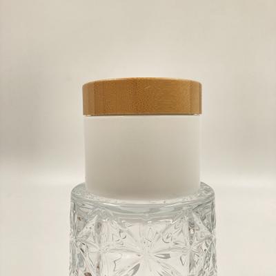 China Customizable Cosmetic Packaging Container 30g 50g PP Bambo Wood Cap Empty Round Eye Cream Container for sale