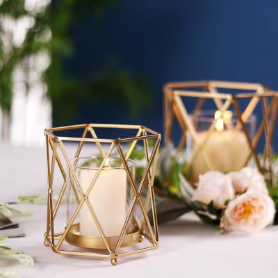 China Hot sale amazon nordic luxury gold color geometric wrought iron windbreak gold home goods votive candle holders for sale