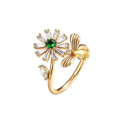 China Fast Delivery 18k Gold Plated Fashion Brass Jewelry Colored Zircon Stones Flower Rotating Rings For Women for sale