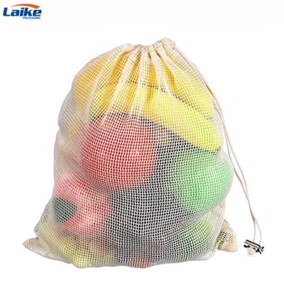 China Recyclable cotton net bag shopping packaging product veggie fruit vegetable mesh drawstring bag with custom logo for sale