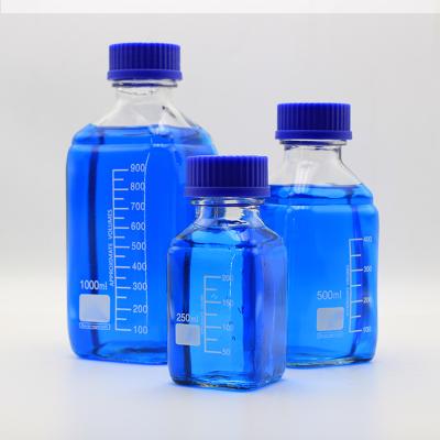 China Lab Bottle Factory Square Cap 250ml500ml1000ml Blue Reagent Flask Glass Bottle Transparent Lab Ware for sale