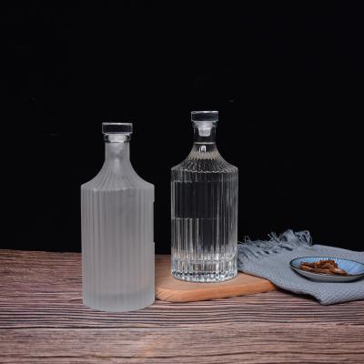 China High End Personal Care Vertical Stripe 500ml Glass Bottle Wine Bottle Beverage Bottle Glass Frosted Lid for sale