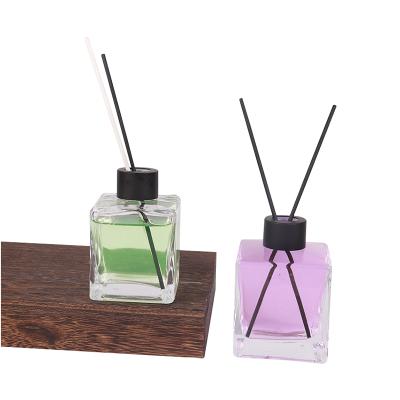 China Glass Products 50ml Square Diffuser Bottle With Transparent Lid Glass Aromatherapy Bottle for sale