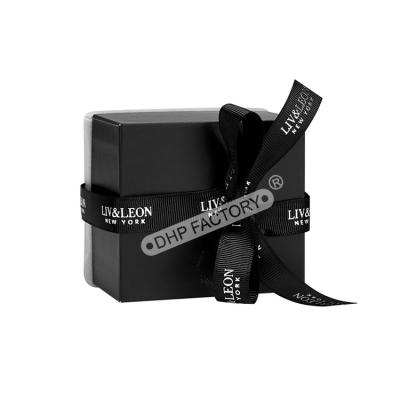 China Black Jewelry Packaging Boxes With Black Ribbon And Velvet Insert for sale